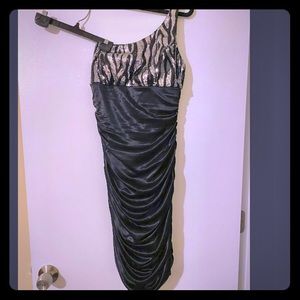 One shoulder silver sparkle and black dress